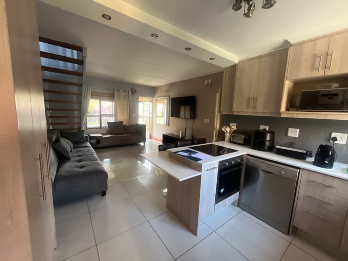 For Sale: Apartment in Bedford Gardens with pool, braai area, and secure parking.