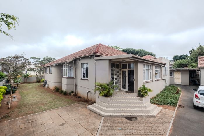 Athlone House For Sale: Income-generating property with approved plans for six units.
