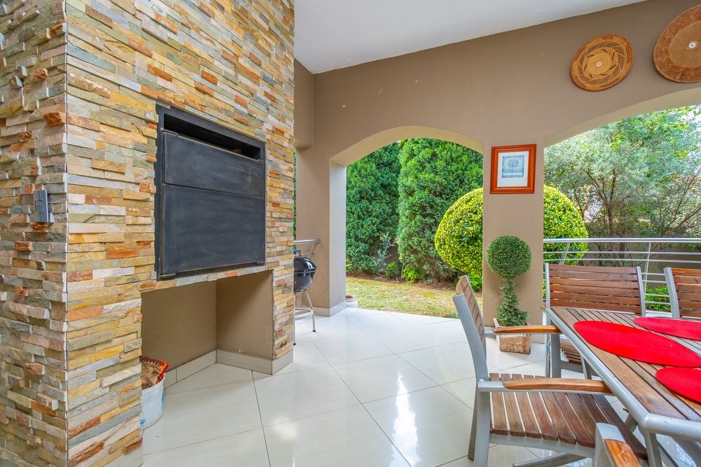 Covered patio with built-in braai