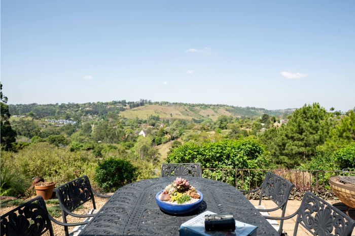 Charming Assagay house for sale with expansive views, garden, and workshop.