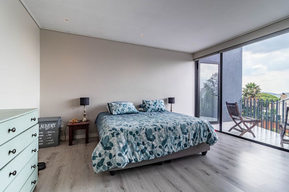 Main bedroom with balcony and gorgeous views