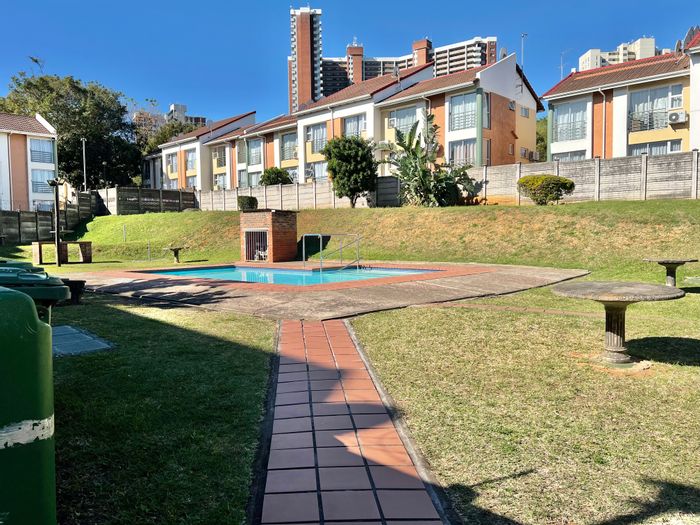 Morningside Apartment For Sale: 1-bedroom duplex with parking, near amenities.