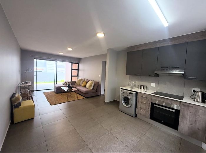 For Sale: 2-bedroom apartment in Montana with clubhouse, pool, and private garden.