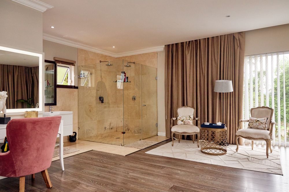 A luxurious two-level retreat with balcony and open-plan en-suite.