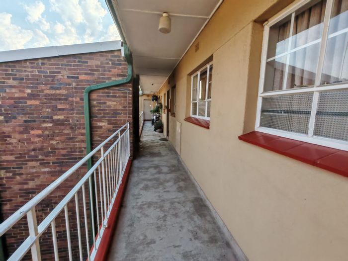 1-Bedroom Apartment For Sale in Sasolburg Central with Garage and Communal Amenities.