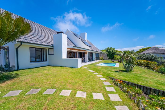 For Sale: House in St Francis Bay Village with views, cottage, and extra plot.