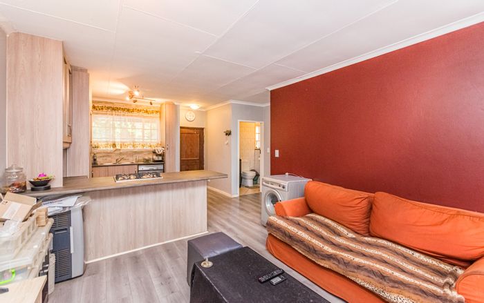 Charming 1-bedroom apartment in Zwartkop, secure complex, near amenities. For Sale.