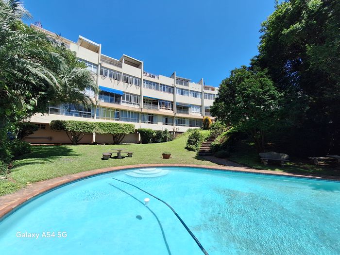 Musgrave Flat For Sale: Ground floor unit with pool, garden views, and parking.