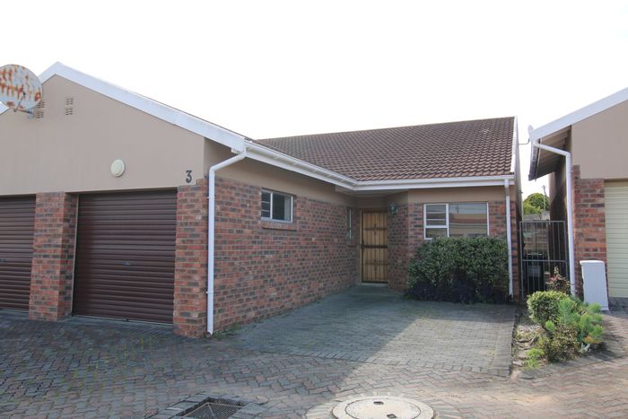 For Sale: 2-bedroom townhouse in Cambridge with garage, near shops and transport.