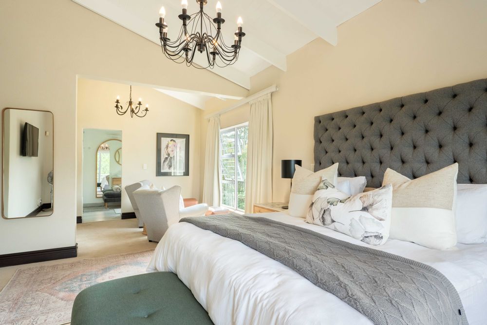 Master Bedroom - A/con, pajama lounge, walk in closet, open beam ceiling, balcony and en-suite bathroom