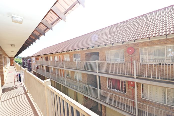 For Sale: Apartment in Kempton Park Central with secure access and garage.