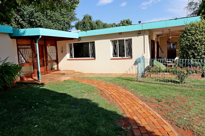 Bredell Small Holding For Sale: Main house, 7 cottages, rental income potential.