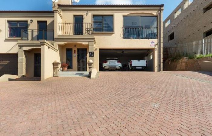 Island View Duet For Sale: Sea views, stairlift, open-plan living, landscaped garden.