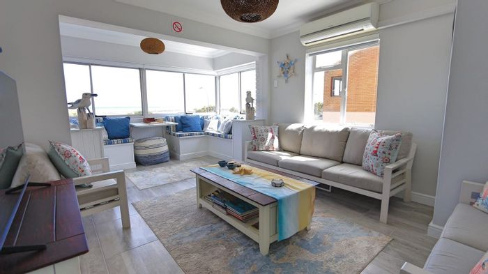 3-bedroom apartment in Gordons Bay Central, steps from beach and amenities. To Rent.