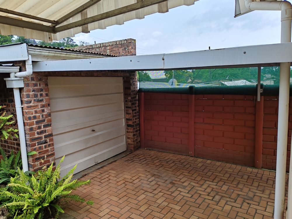 Single garage and carport