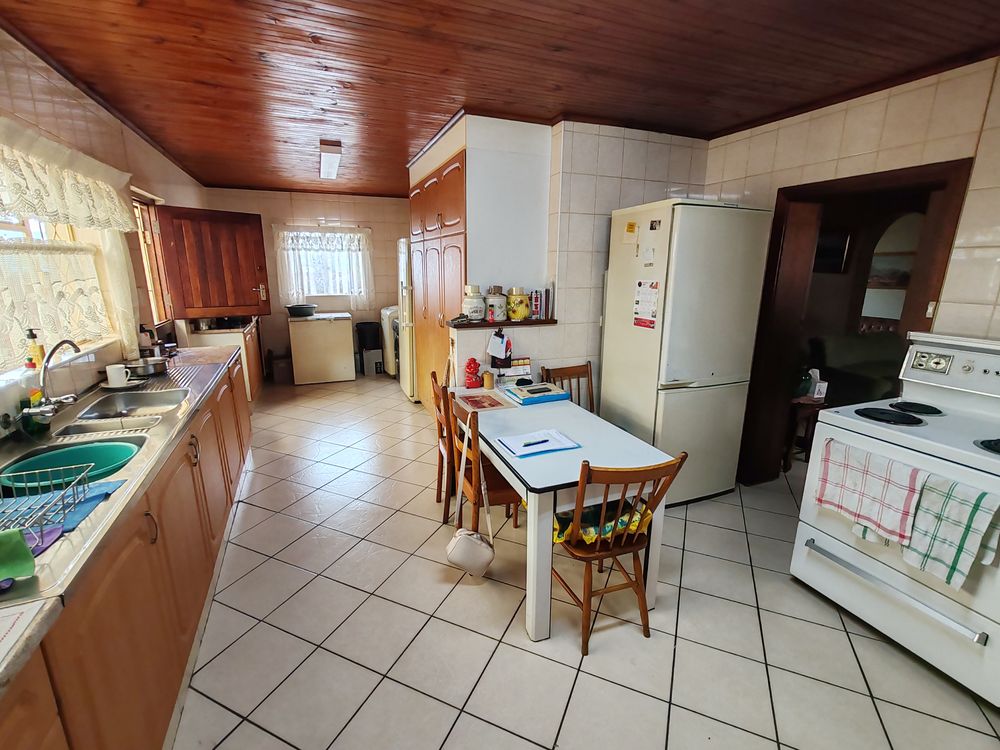 Scullery and laundry at the end of the kitchen