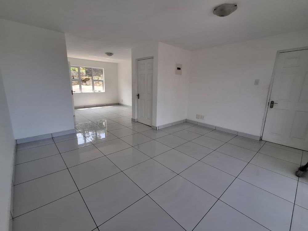 Open plan lower-level entertainment/dining area 1