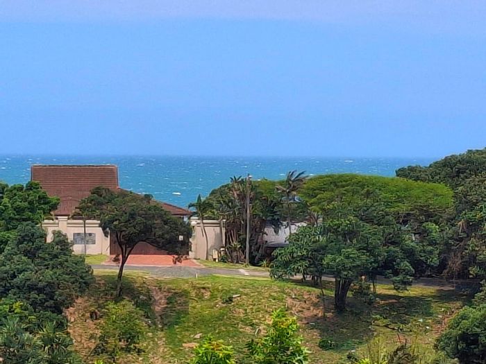 For Sale: Zinkwazi Beach House with dual rental units, beach access, and ample parking.