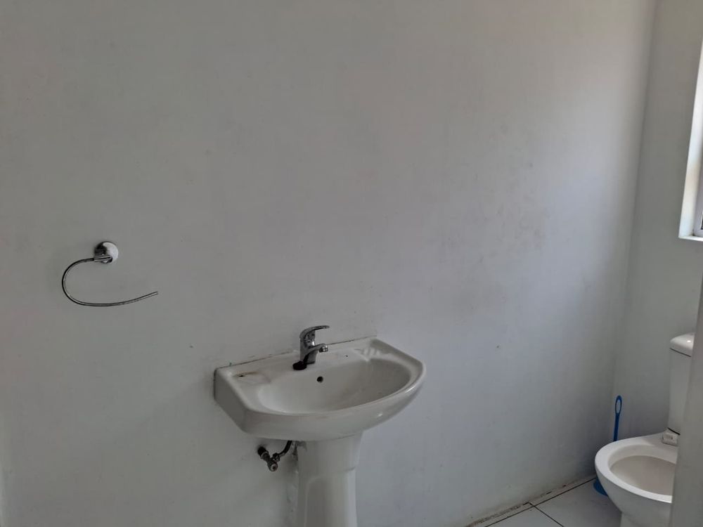 Bathroom 2 toilet and basin with shower