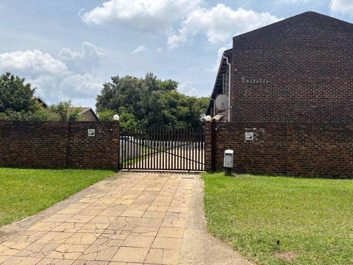 For Sale: Duplex apartments in Piet Retief Central, 9 bedrooms, garages, investment potential.