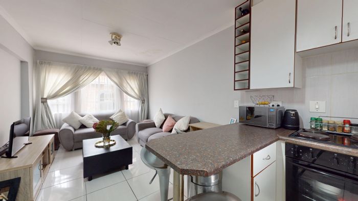 Ravenswood Apartment For Sale: 1-bed, pool, braai area, secure parking, close to amenities.