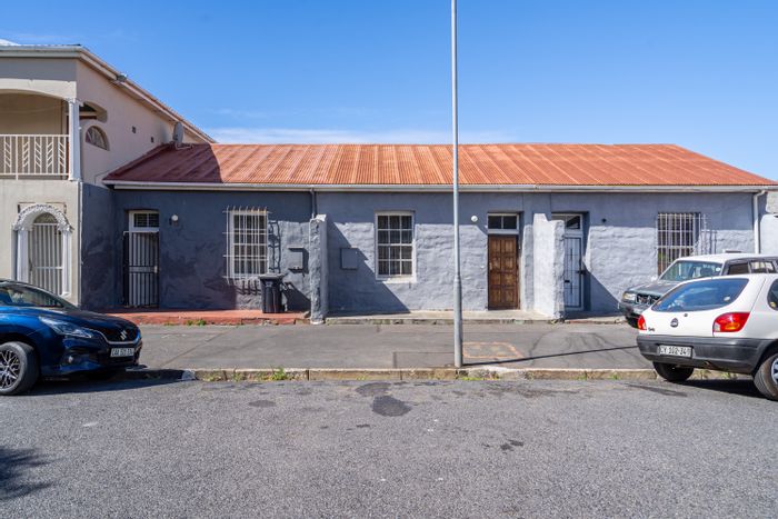 For Sale: Unique Woodstock house with three homes, GR4 zoning, rental potential.