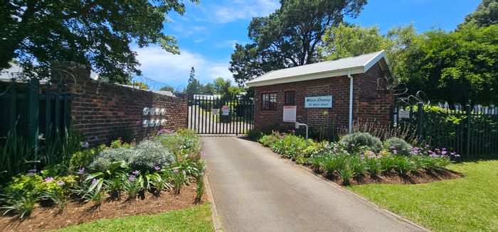 Greendale Townhouse For Sale: Open-plan living, private garden, extra-length garage.