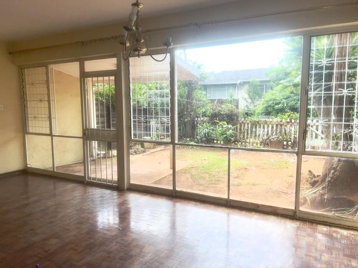 Spacious Highlands North townhouse for sale: 3 beds, 2.5 baths, pools, security.