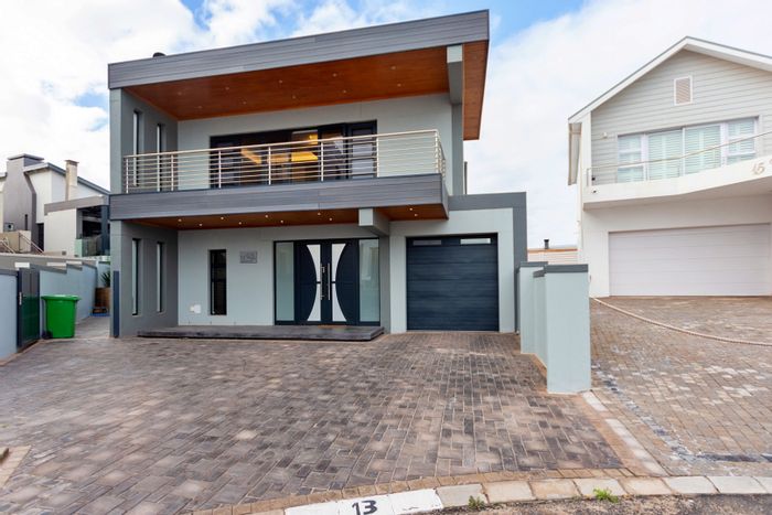 Calypso Beach House For Sale: Ocean views, heated pool, 5 bedrooms, Airbnb potential.