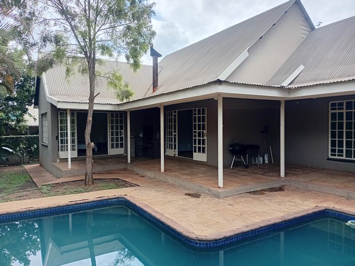 For Sale: House in Malelane Central with pool, garden, and spacious living areas.