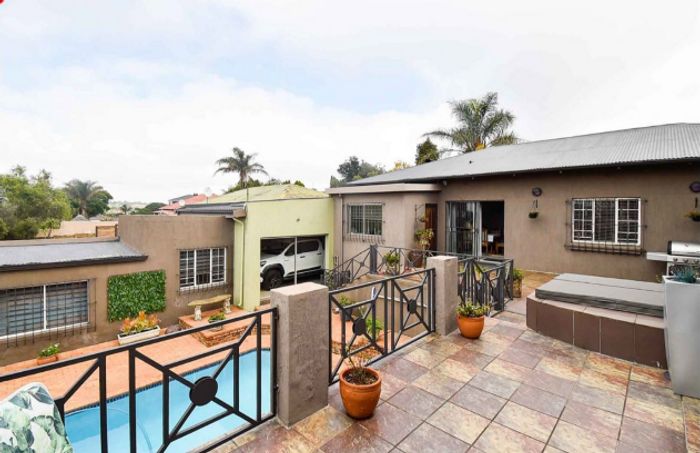 For Sale: House in Discovery with pool, cottage, and extensive security features.