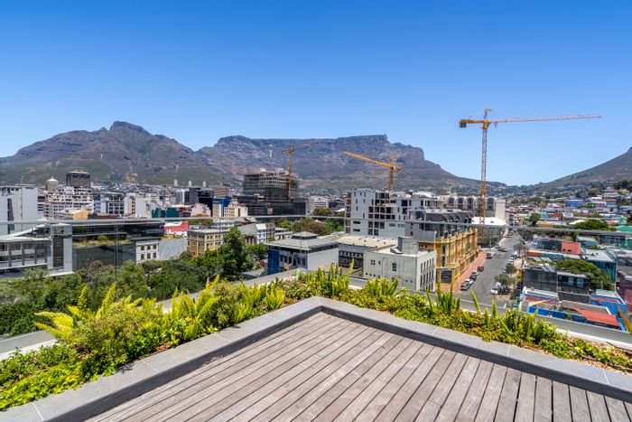 De Waterkant Apartment For Sale: Rooftop pool, Airbnb potential, prime location.