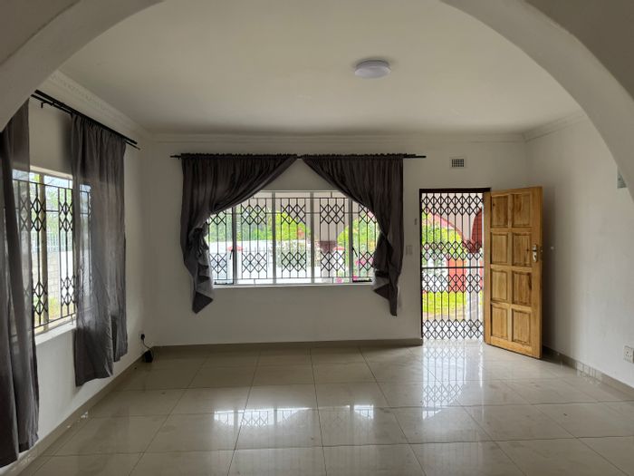 For Sale: Spacious 4-bedroom house in Craigieburn with dual kitchens and security features.