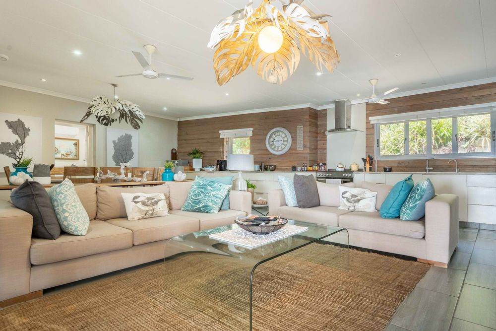 Living area with kitchen in background