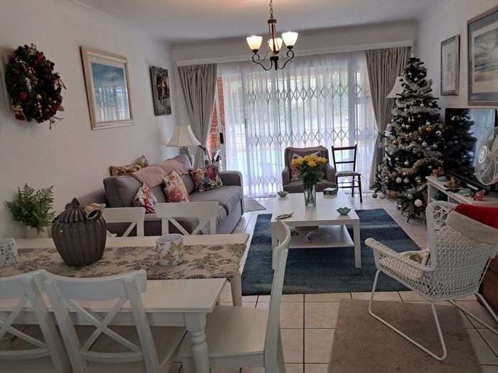 For Sale: 2-Bedroom Apartment in Pelham with Open-Plan Living and Secure Porch.