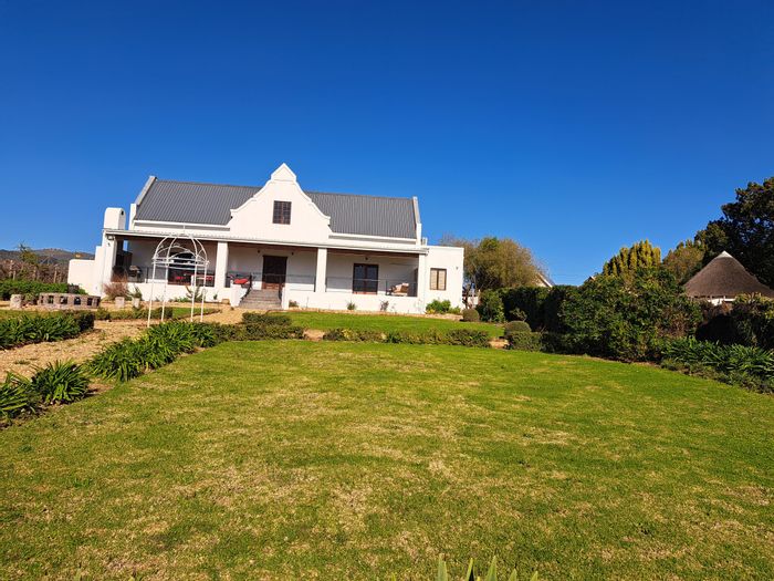 Paarl Rural farm for sale: guesthouse, wedding venue, solar power, stunning views.