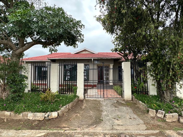 Versatile Mbuqu house for sale: dual units, parking, garden, near amenities.