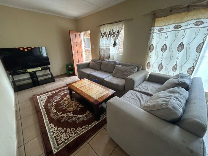 For Sale: 2-Bedroom Townhouse in Bergsig with secure parking and community amenities.