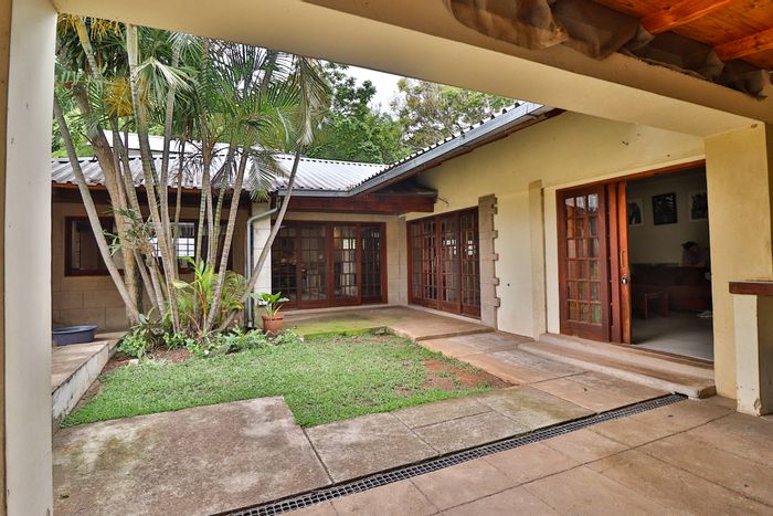 Two-bedroom house with pool, garden, and mountain views in Barberton Central For Sale.