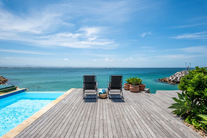 For Sale: Oceanfront Apartment in Port St Francis with private elevator and Airbnb potential.