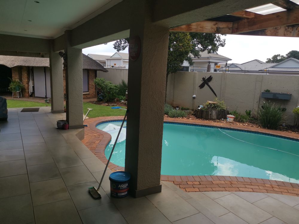 Under cover patio with braai area and Pool
