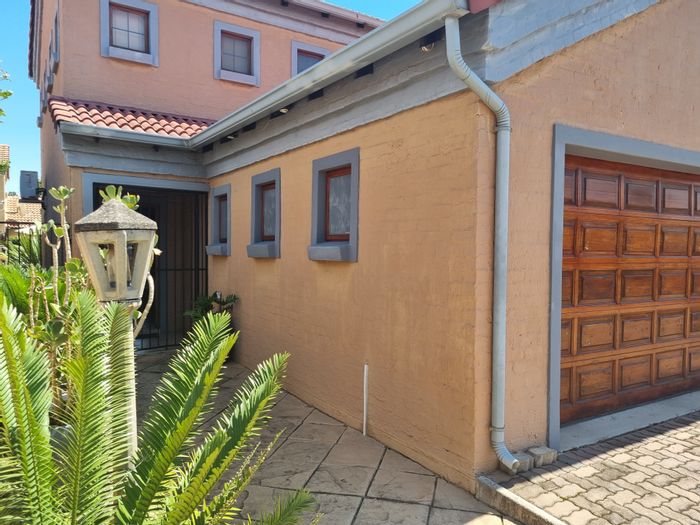 For Sale: Equestria Townhouse with pool, solar power, study, and double garage.