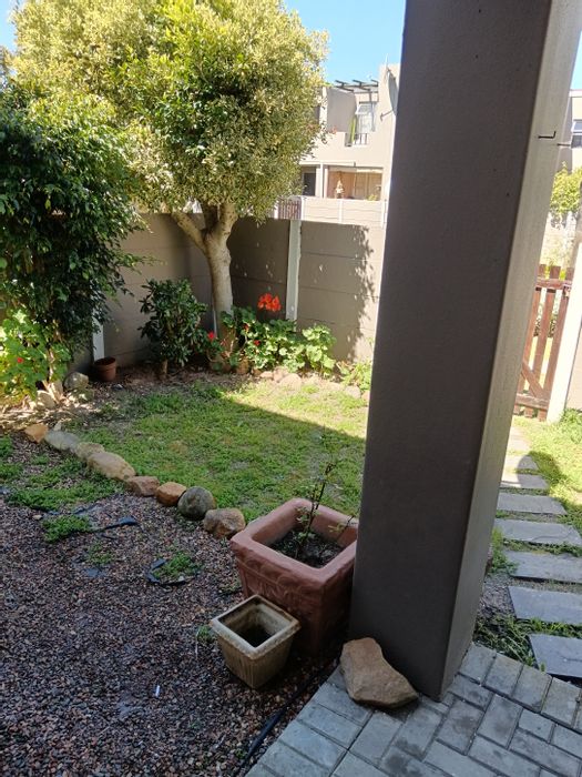 West Beach Apartment To Rent: 2 Bedrooms, Private Garden, Communal Pool Access.