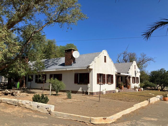 Farm for Sale in Vanwyksvlei: 4 beds, extensive water supply, sheep farming potential.