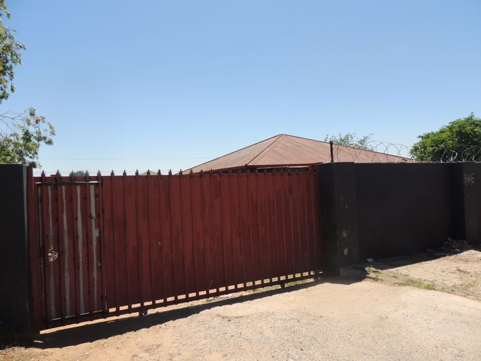 Income-generating multi-unit house for sale in South Hills with ample parking.