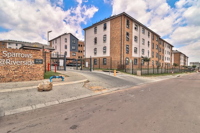 For Sale: Riverside View Apartment with 2 Bedrooms, Parking, and Secure Complex.