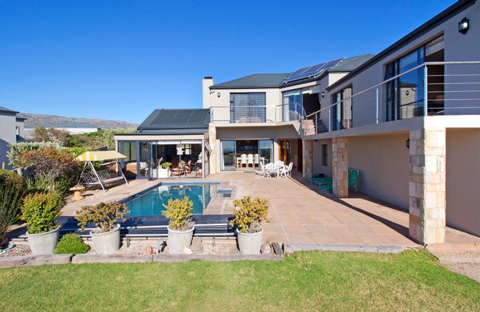 House For Sale in Stonehaven Estate: Pool, garden, views, and 24-hour security.