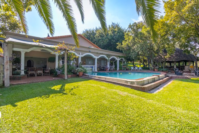 For Sale: 18-Bedroom Guest House in Lanseria with extensive amenities and riverfront views.