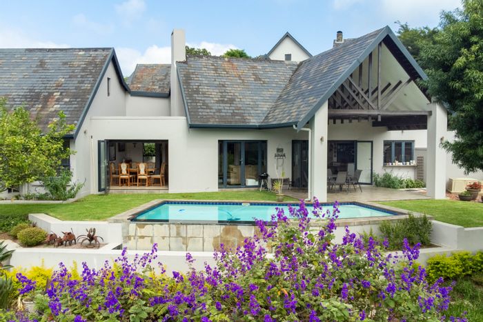 For Sale: House in Cotswold Downs Golf & Country Estate with pool, cottage, and views.