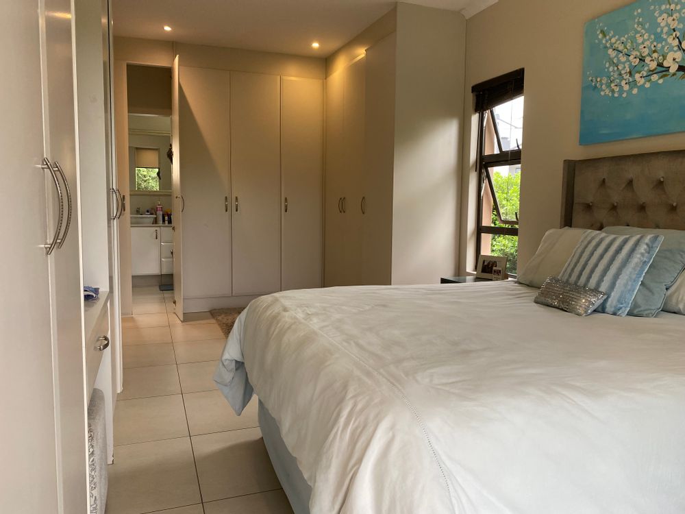 Main bedroom showing BIC's and en-suite entrance